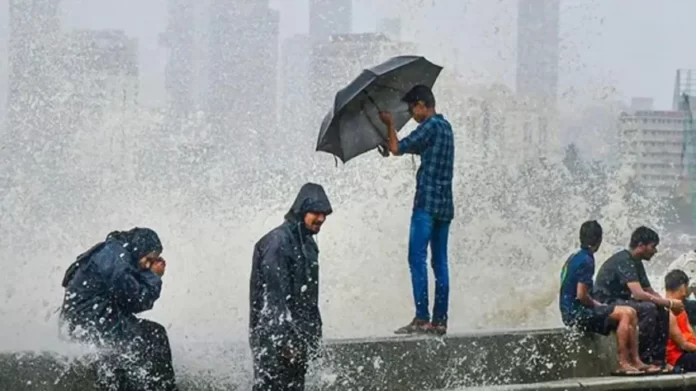 People in Rain on Mumbai Marine drive