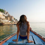 Girl Sitting on Boat in Kashi