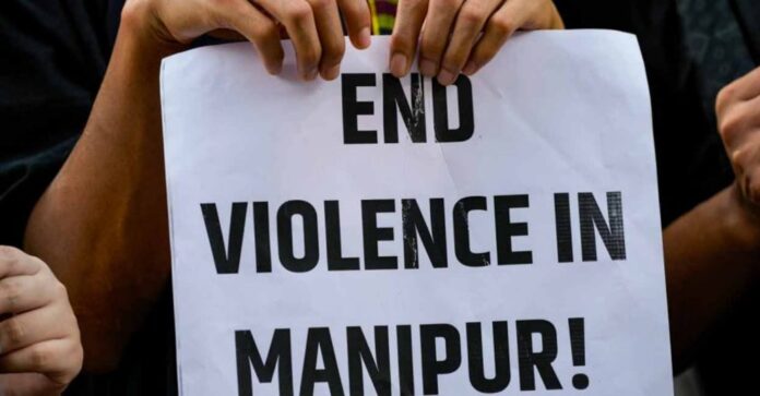 End Violence in Manipur Written on White Paper