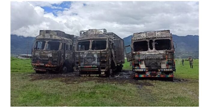 Three trucks set ablaze woman shot dead in Imphal