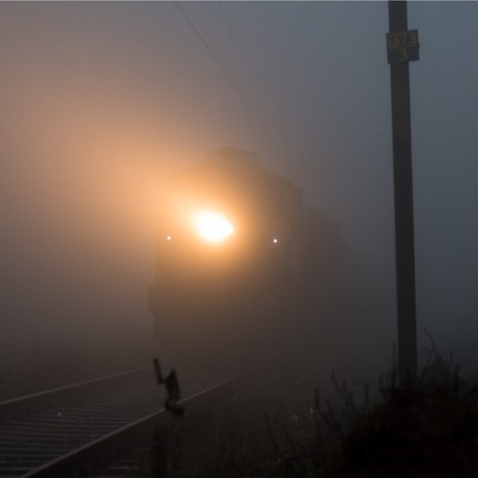 Foggy railway track