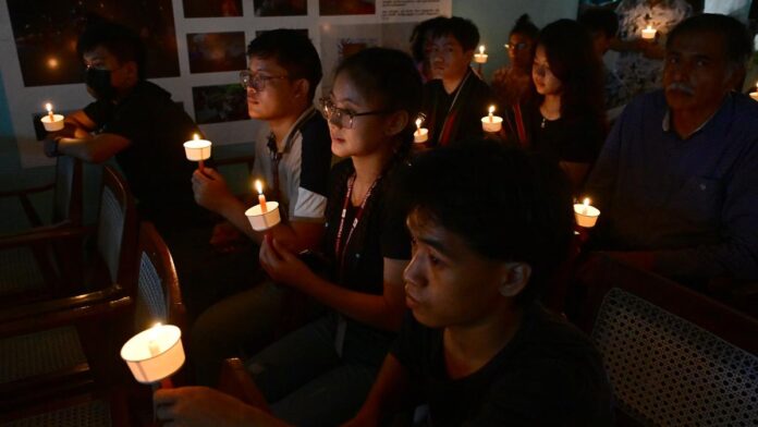 activists holding candles