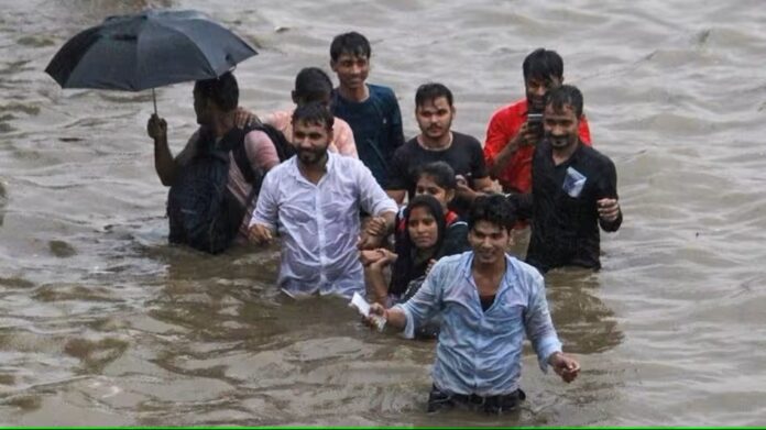 people in flood water