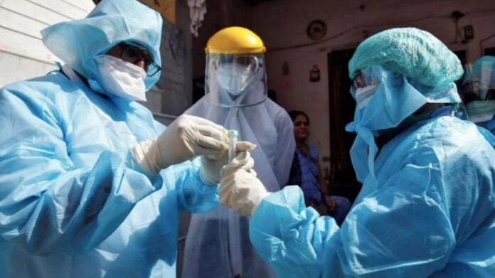 Healthcare workers testing for Covid-19 in Arunachal