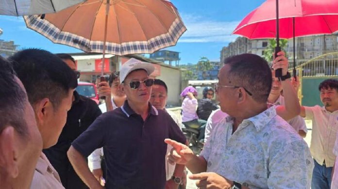 Arunachal minister inspecting helipad area