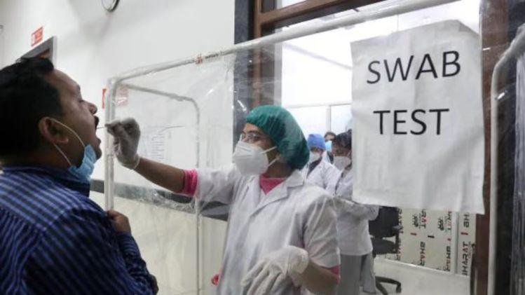 Health workers in Mizoram performing Covid-19 testing in a community setting