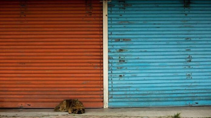 Empty streets during 12-hour bandh in Assam's Duliajan on May 23, 2025 Deserted roads and shut shops during Assam Duliajan bandh protest