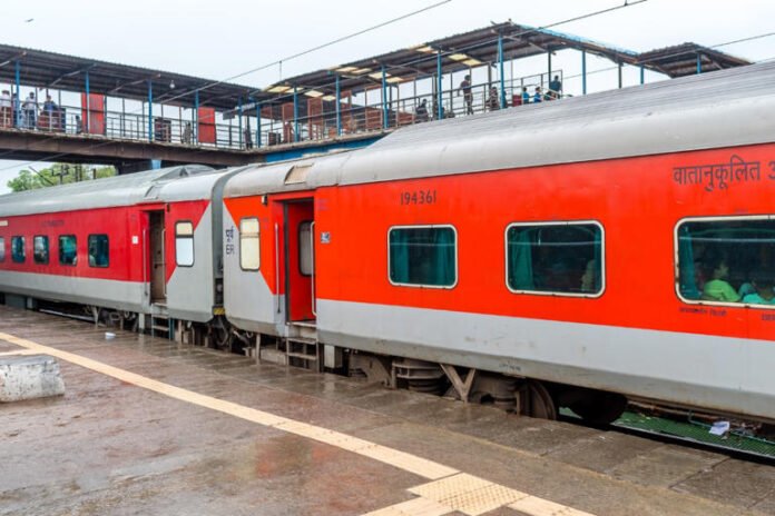 A train moving through scenic hills as Indian Railways expands to Northeast states