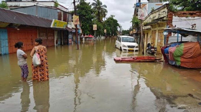 people monitoring flood response in Tripura