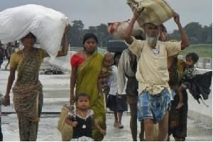 Assam deportation of Bangladeshi immigrants Assam deportation of Bangladeshi immigrants