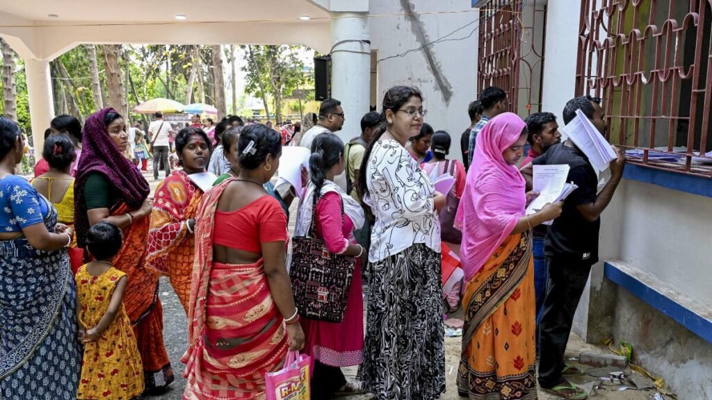 Voters standing in line during West Bengal Assembly Elections Phase at a polling booth