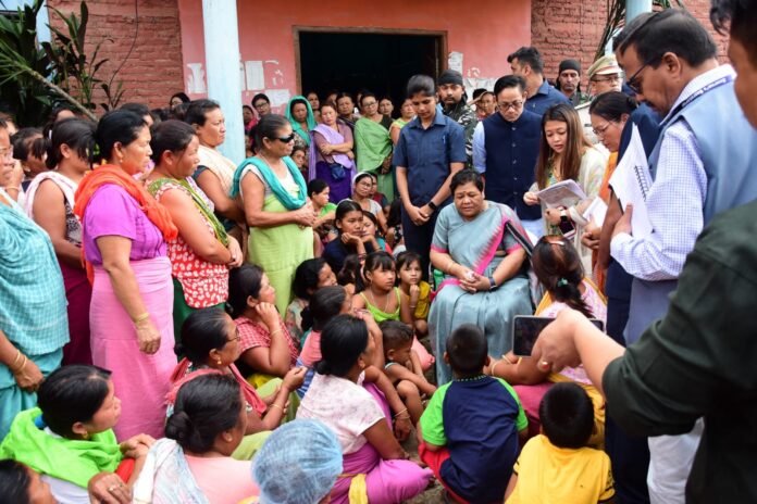 Inquiry commission officials speaking with internally displaced persons at Manipur relief camp