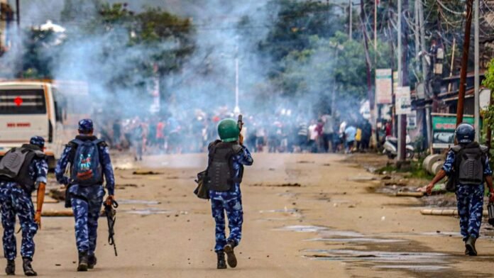 Security personnel and emergency responders deployed in Moirang following violent clashes and injuries