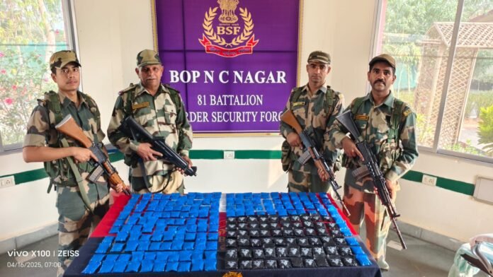 Tripura Police and BSF officials displaying seized Yaba tablets after border operation