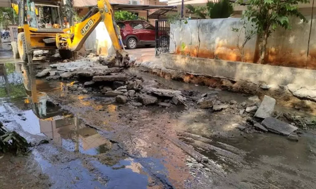 Repair teams working near a damaged gas pipeline during Smart City development activity in Agartala