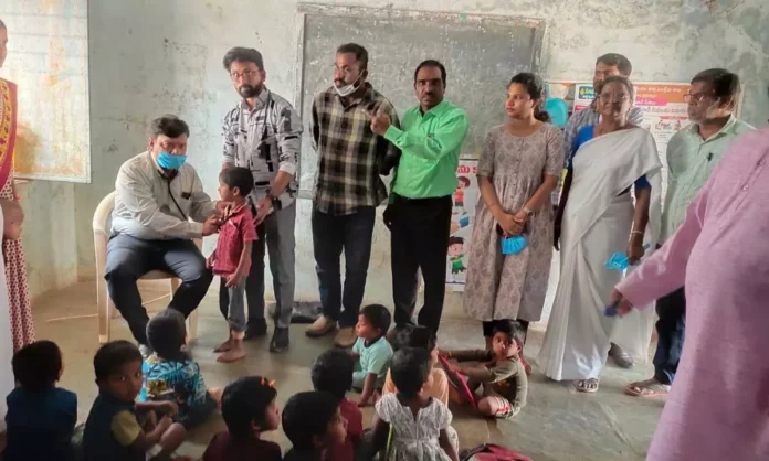 Medical outreach and educational supply distribution during a community wellness camp at Tuichakma Community Hall