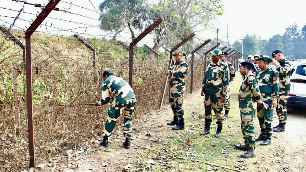 BSF personnel working on border fencing along India Bangladesh border in West Bengal