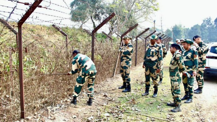 BSF personnel working on border fencing along India Bangladesh border in West Bengal