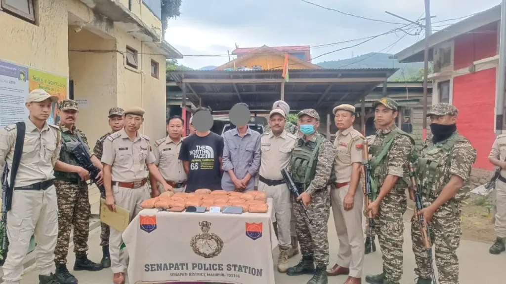 Security personnel display seized narcotics following the Senapati Brown Sugar Seizure at T. Khullen Check Post in Manipur.