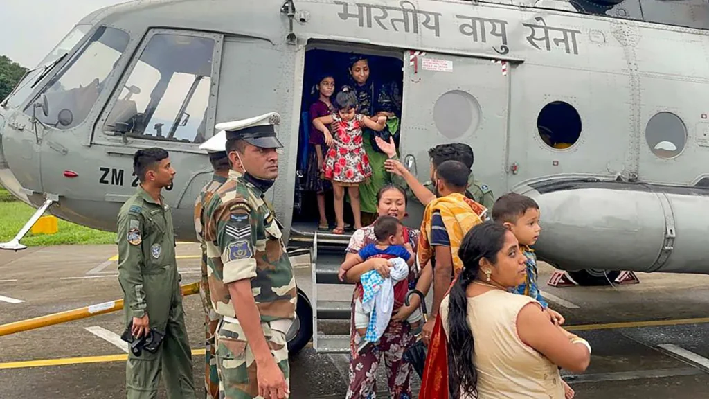 Indian Air Force transport helicopter delivers relief supplies and evacuates stranded villagers in flood-affected rural Arunachal Pradesh.