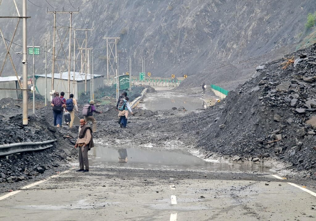 Vehicles moving slowly along National Highway 10 during the NH10 Traffic Disruption Crisis caused by minor landslides and mud slips.