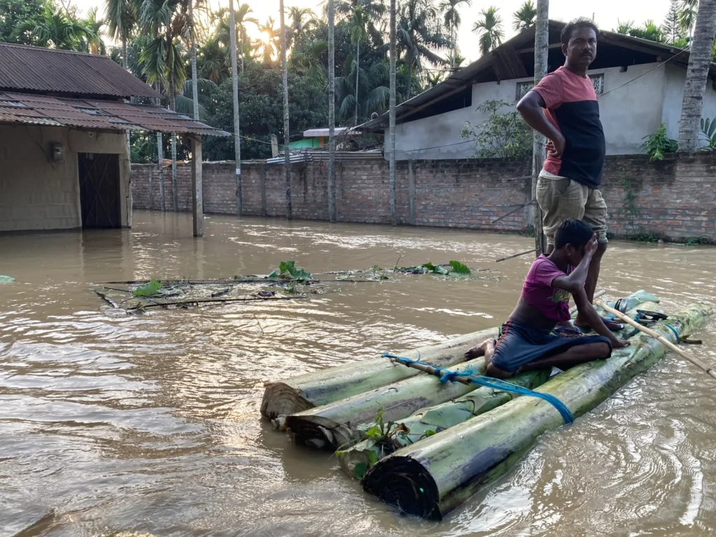 Overflowing rivers flood low-lying areas in lower Assam after intense rainfall across the Sub-Himalayan region near West Bengal.
