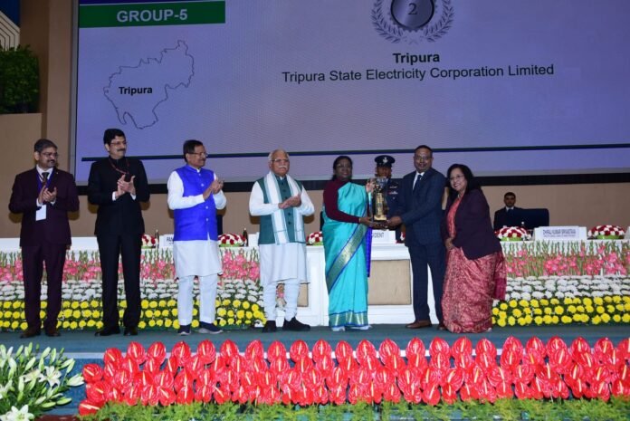 National-level medal-winning athletes from Tripura receiving enhanced cash incentive awards during a sports recognition ceremony.