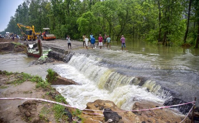 mage Alt Text: Emergency teams monitor river conditions as residents evacuate vulnerable downstream areas near the Assam-Arunachal Pradesh border.