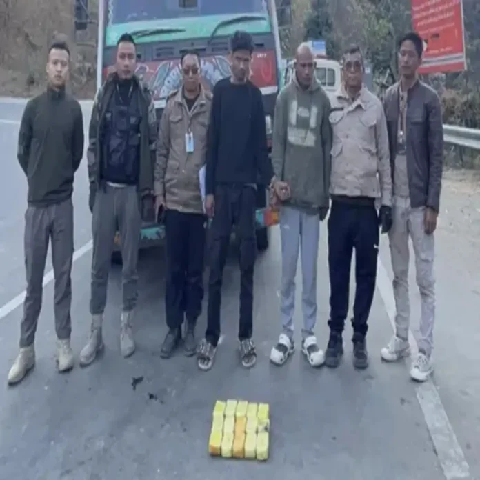 Mizoram Police inspect commercial trucks after recovering a suspected heroin consignment during a major anti-narcotics operation.