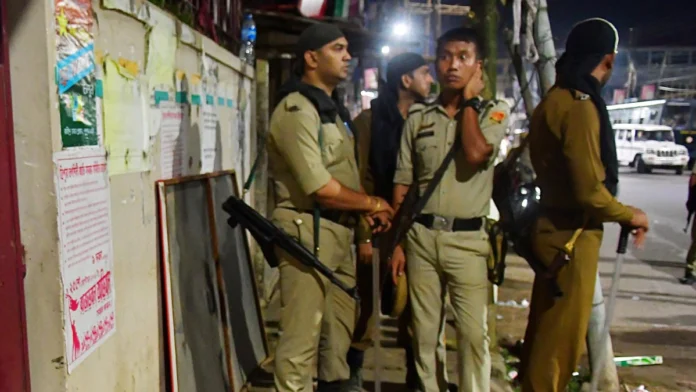 Police personnel involved in the investigation following the Fake Social Worker Arrest in Tripura.
