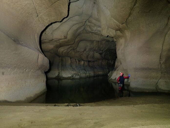 Explorers mapping newly discovered limestone cave systems in Meghalaya’s Jaintia Hills region.