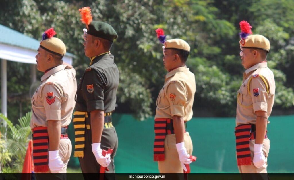 Manipur Police athletes displaying medals won at a national sports competition in Lucknow.