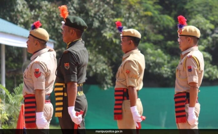 Manipur Police athletes displaying medals won at a national sports competition in Lucknow.