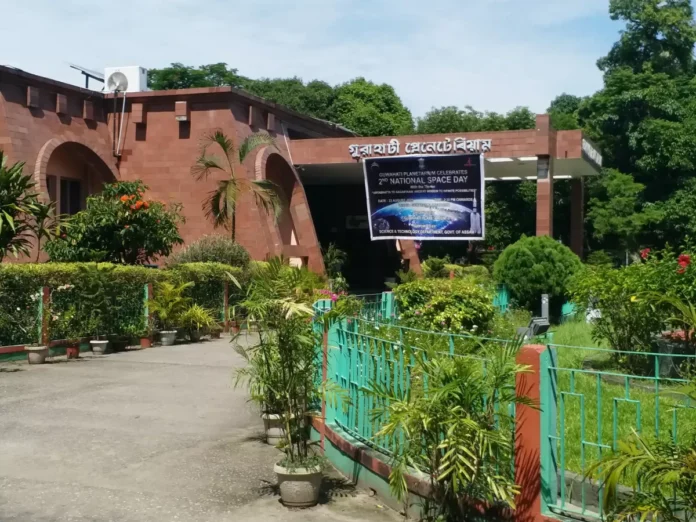 School students attending a special astronomical show at the Guwahati Planetarium featuring digital sky simulations.