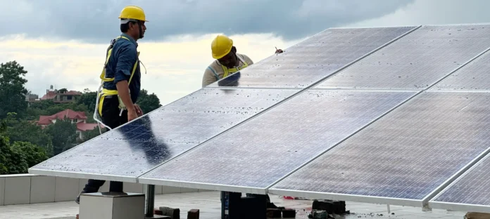 Rural youths receiving technical training for careers in the commercial solar energy industry.