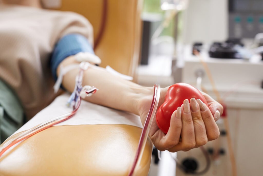 Medical staff managing blood storage units in a district healthcare facility