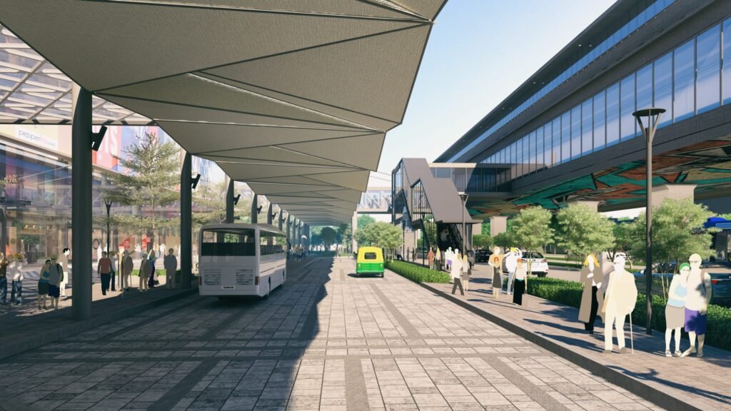 Construction site of a multi-modal transit hub in Agartala with workers and infrastructure development activities in progress.