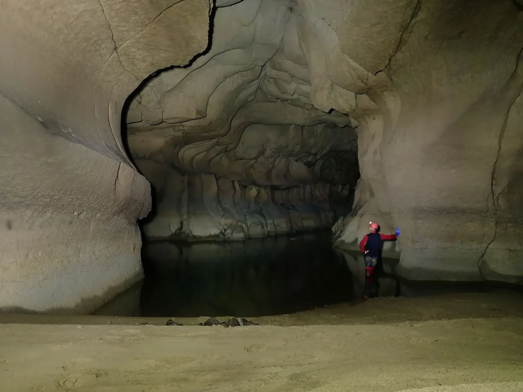Cave explorers surveying newly mapped limestone cave systems in Meghalaya's Jaintia Hills region.