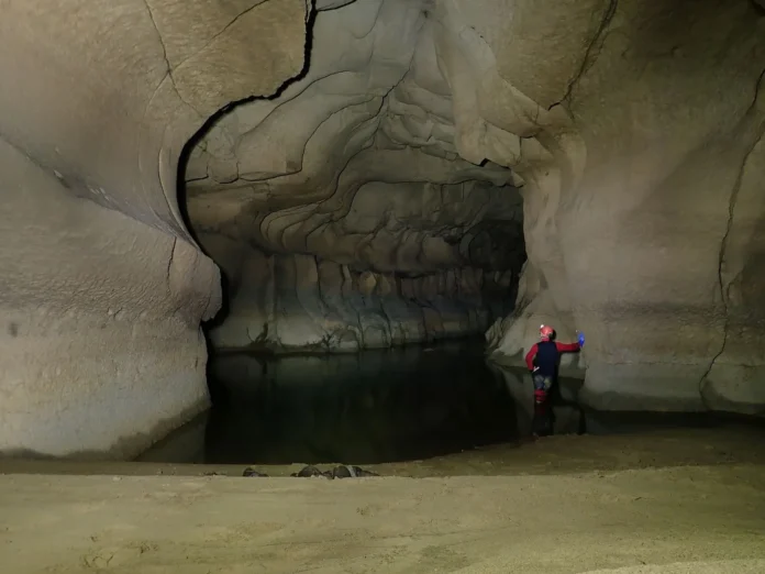 Cave explorers surveying newly mapped limestone cave systems in Meghalaya's Jaintia Hills region.