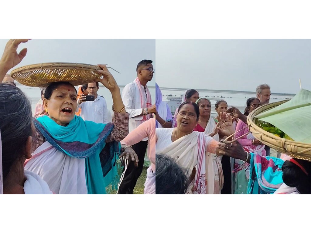 Crowds watching traditional sports competitions during a cultural festival on Majuli Island in Assam.