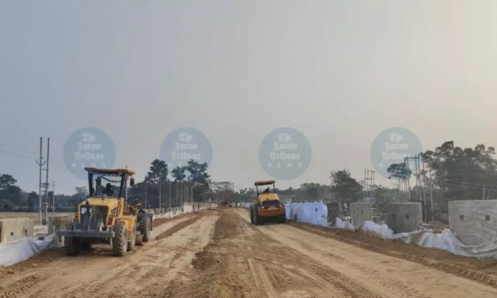 Construction equipment stationed along the Jorhat-Jhanji highway following the Jorhat Jhanji Contract Cancellation by NHIDCL.