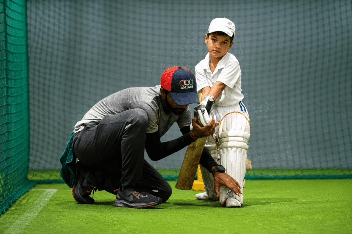 Young cricketers participating in training sessions at a newly launched Northeast cricket academy.