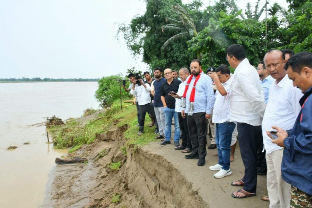Floodwaters inundate villages in Assam's Dhemaji district as rescue teams assist displaced residents during severe monsoon flooding.