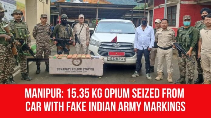 Security personnel inspect a fake army vehicle after recovering 15.35 kg of opium during a joint operation in Manipur's Senapati district.