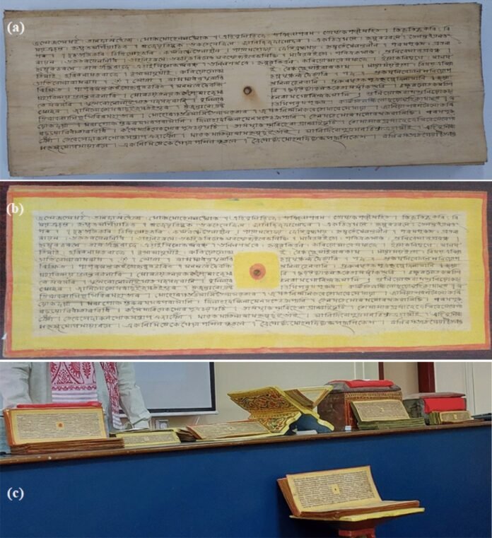 Archivists scanning centuries-old royal manuscripts in Manipur State Museum for digital preservation and restoration.