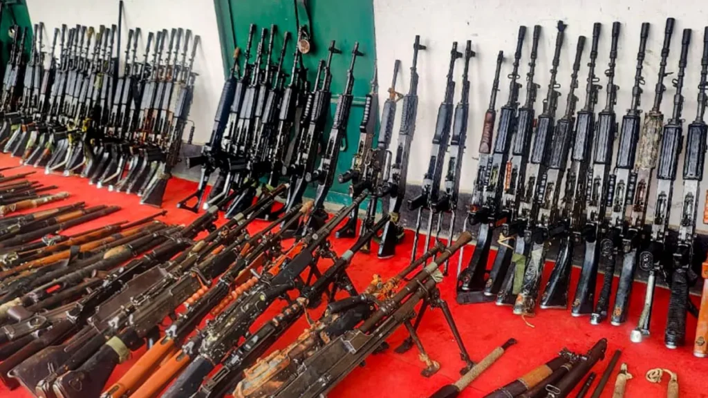 Security forces conducting a large-scale operation to recover 328 stolen weapons from volatile districts across Manipur.