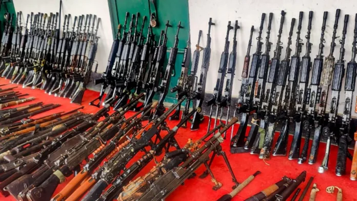 Security forces conducting a large-scale operation to recover 328 stolen weapons from volatile districts across Manipur.