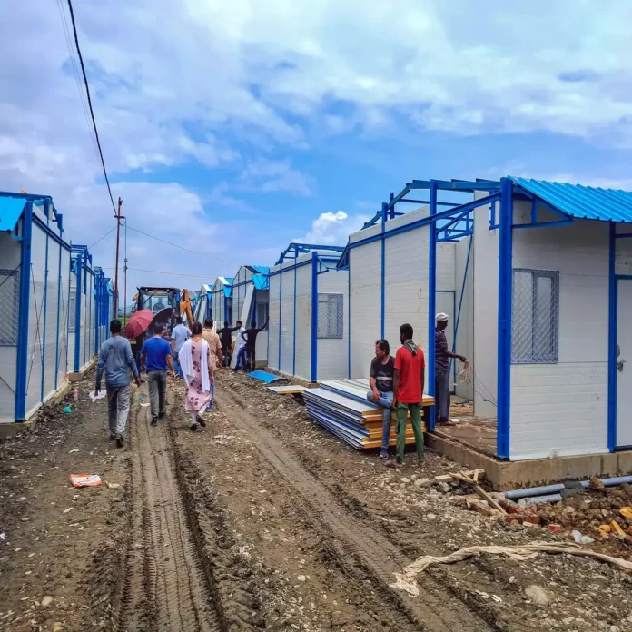 Newly completed low-cost houses built under a rural housing scheme in Manipur for economically vulnerable families.