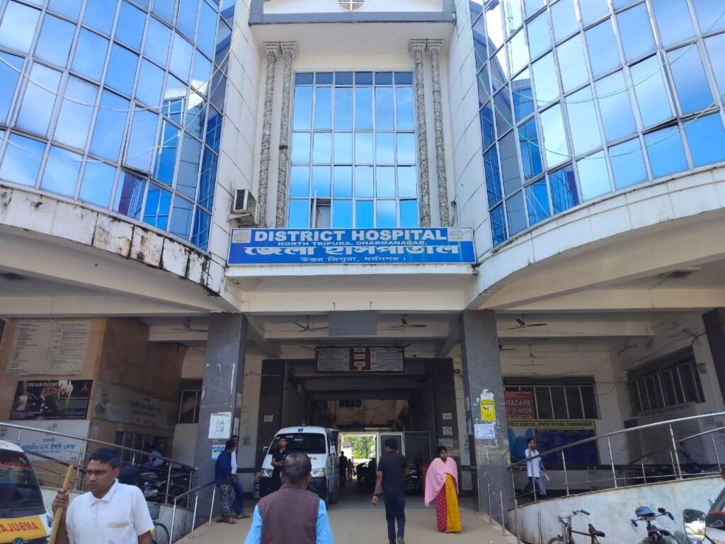 Dharmanagar District Hospital building under administrative scrutiny following allegations of financial irregularities in maintenance operations.