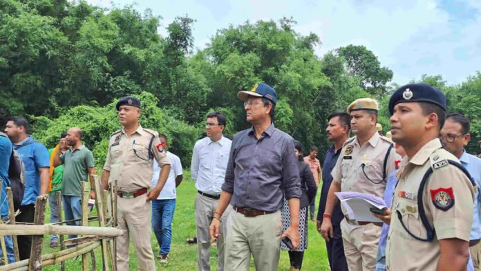 Assam Police personnel conducting a security operation during a criminal investigation.